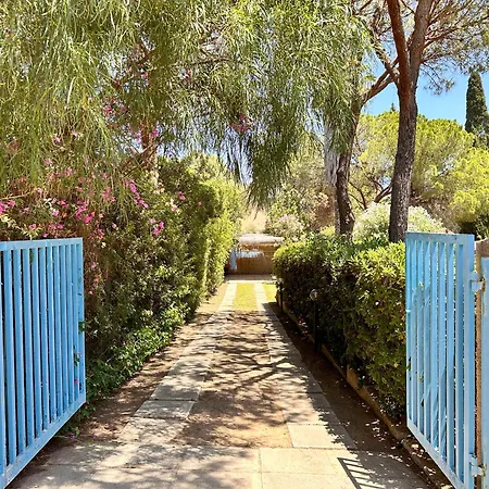 Blue Shutters By The Tatil Evi