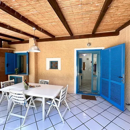 Blue Shutters By The *