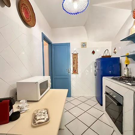 Blue Shutters By The Tatil Evi