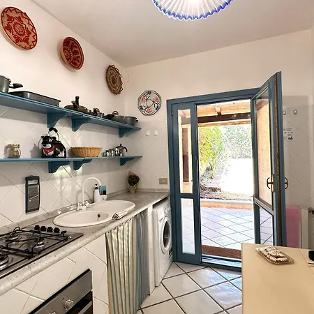 Blue Shutters By The Tatil Evi Pula