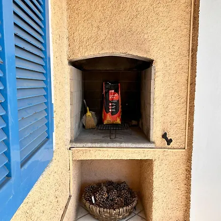 Blue Shutters By The Tatil Evi Pula